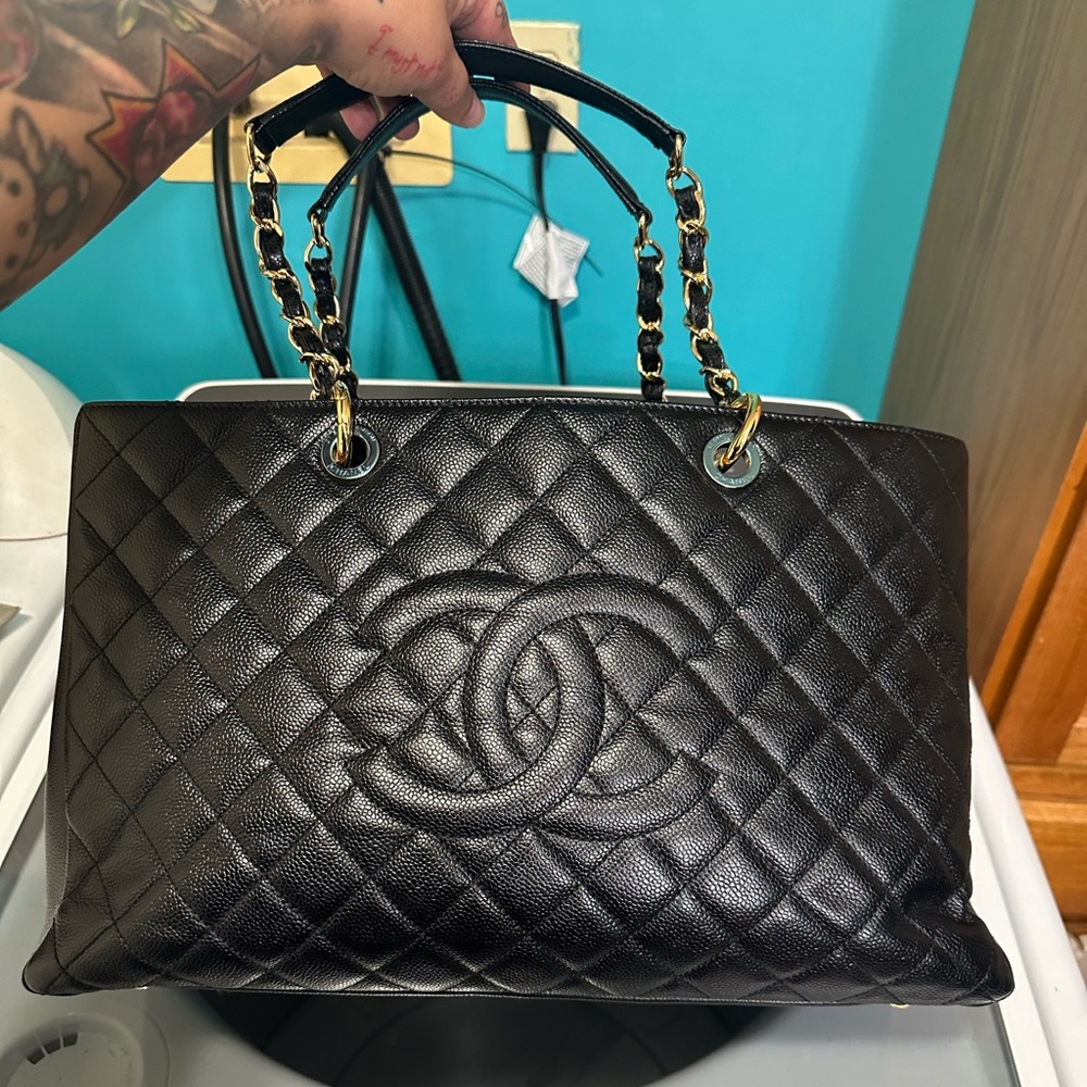 Chanel Gst Xl black with gold hardware